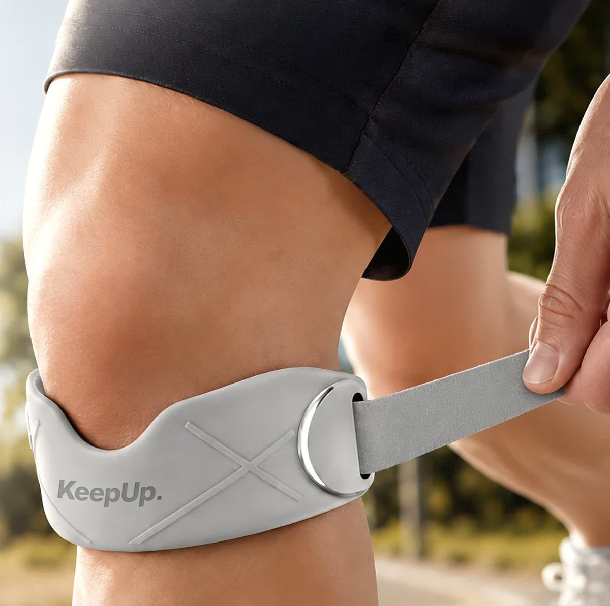 Pulling the strap through the buckle